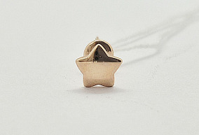 Золотая серьга