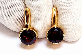 Золотые серьги с гранатом