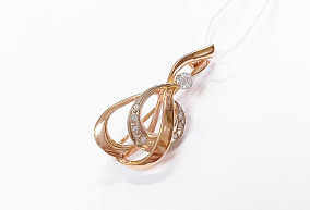 Золотая брошь с камнем