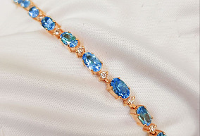 Злотой браслет с топазами и фианитами р-р 18 