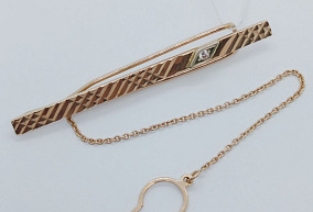 Золотой зажим для галстука Золотой зажим для галстука