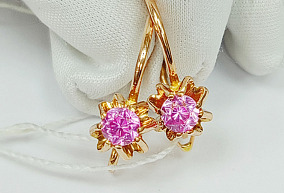 Золотые серьги с корундом