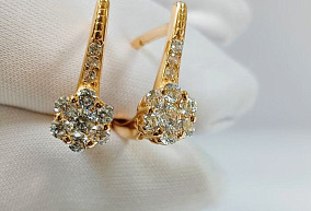 Золотая серьга с фианитами 585