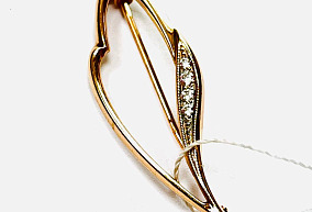 Золотая брошь с фианитами